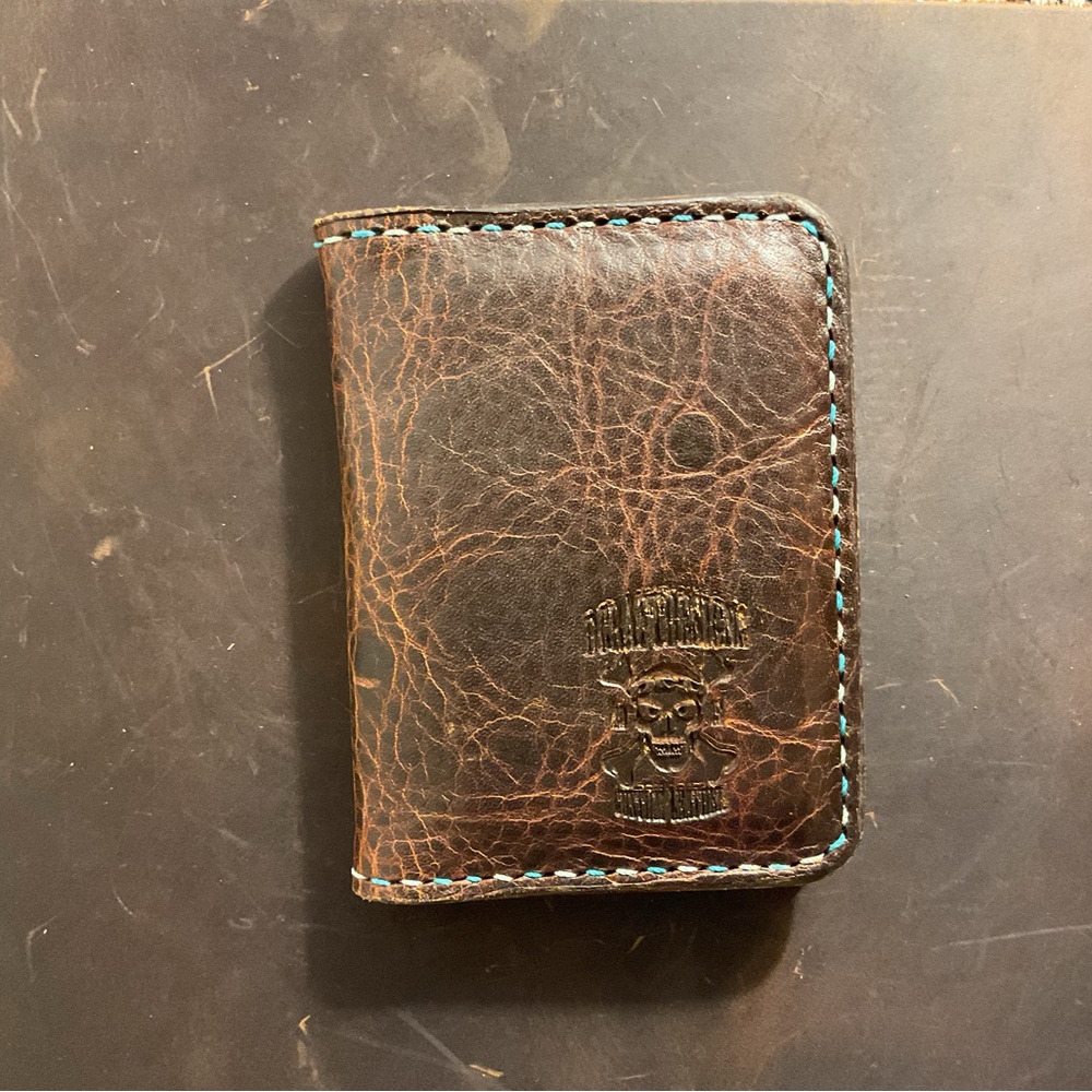 Leather front pocket wallet. Custom made wallet with paisley liner.
